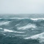 Dark and stormy waves with whitecaps