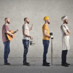 6 of the same man in a line facing right, dressed as several careers, including a handy man, musician, chef, and business person.