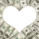 One-hundred-dollar bills are fanned out so the shape forms a white heart in the center.